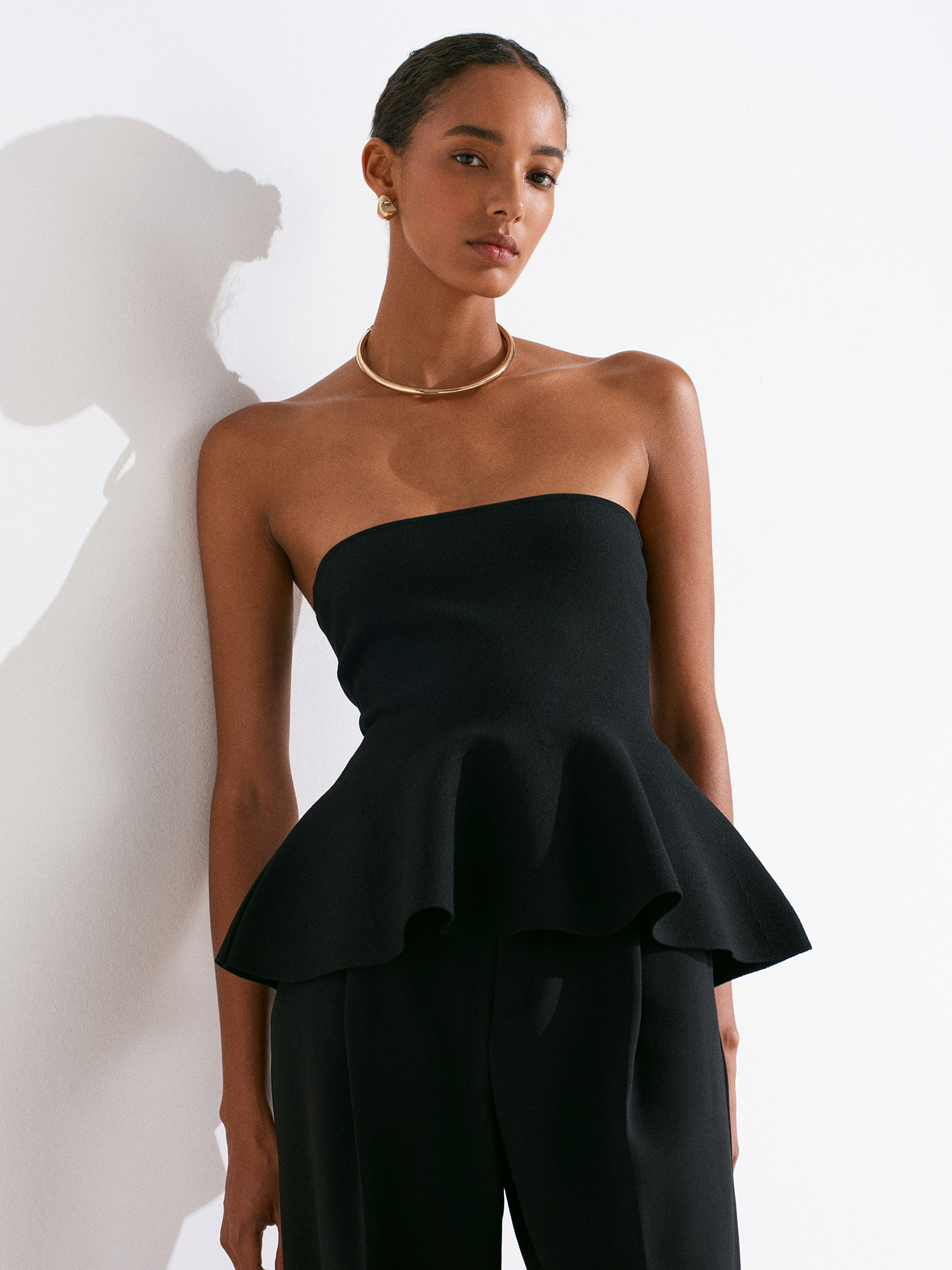 The Contour Peplum Top